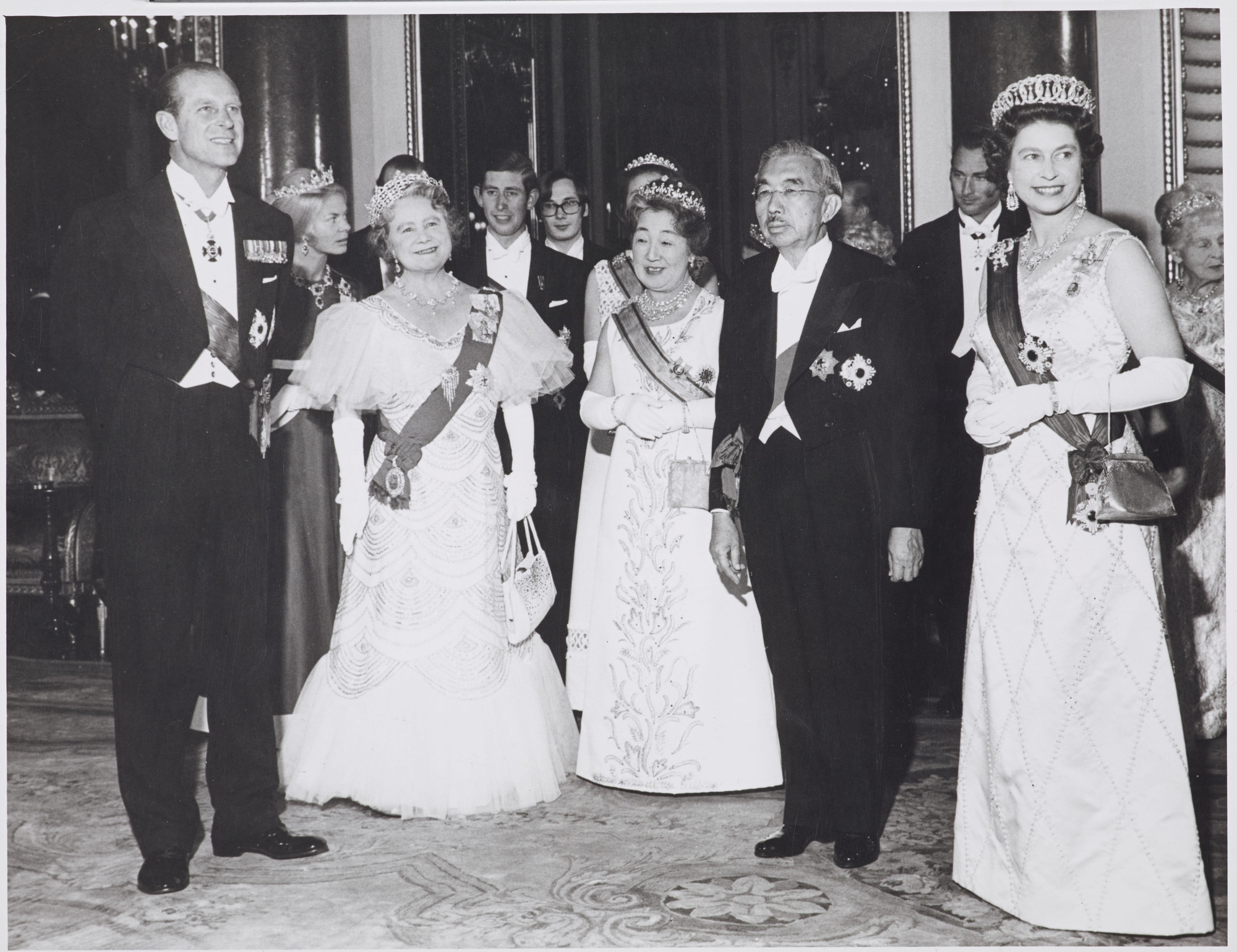 Black and white photograph of Prince Philip, the Queen Mother, Empress Nagako of Japan, Emperor Hirohito of Japan and Queen Elizabeth II