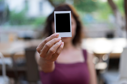 Woman with Polaroid