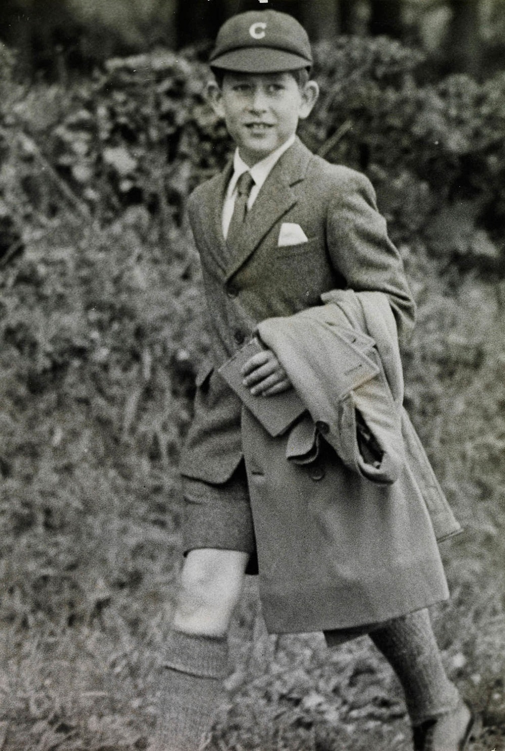 Photograph of a young Prince Charles (now King Charles III) in a school uniform in 1958